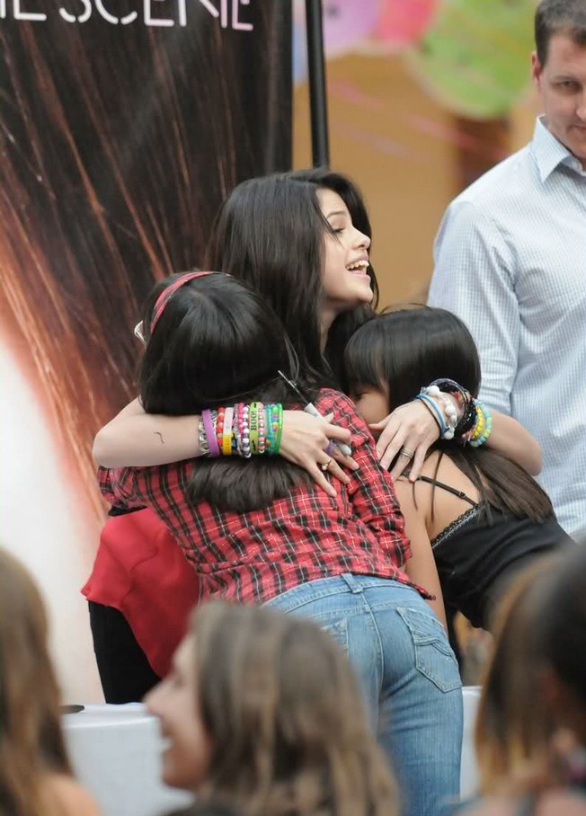 Costa Mesa, CA - Selena Gomez meets and greets a sea of fans at South Coast Plaza mall to promote her first album "Kiss & Tell" with her band "The Scene". The Disney star is following the footsteps of many previous Disney alumni, adding music to her repertoire like Britney Spears, Christina Aguilara, and Justin Timberlake. The first single off her debut album is "Falling Down", which released on August 21. GSI Media October 3, 2009 (310) 505-8447 (323) 423-9397 (310) 261-8649