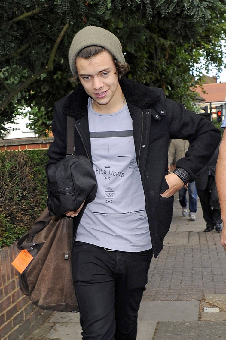 Harry Styles of One Direction arrives at a private residence to film a promotional clip for BBC Radio 1 DJ Nick Grimshaw