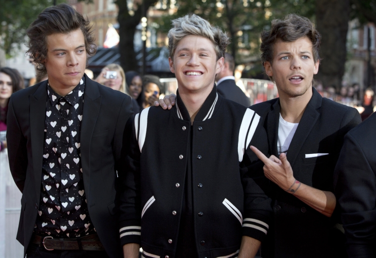 One Direction pose for photographers at the world premiere of their film "One Direction: This is Us", in London
