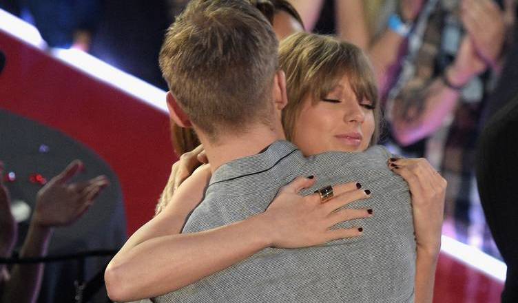 INGLEWOOD, CALIFORNIA - APRIL 03: Recording artist Taylor Swift (R) hugs Calvin Harris at the iHeartRadio Music Awards which broadcasted live on TBS, TNT, AND TRUTV from The Forum on April 3, 2016 in Inglewood, California. (Photo by Jason Kempin/Getty Images for iHeartRadio / Turner)