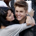SELENA VISITS JUSTIN ON SET! Justin Bieber and Selena Gomez embrace and kiss as she visits him on the set of his new music video ‘Boyfriend’